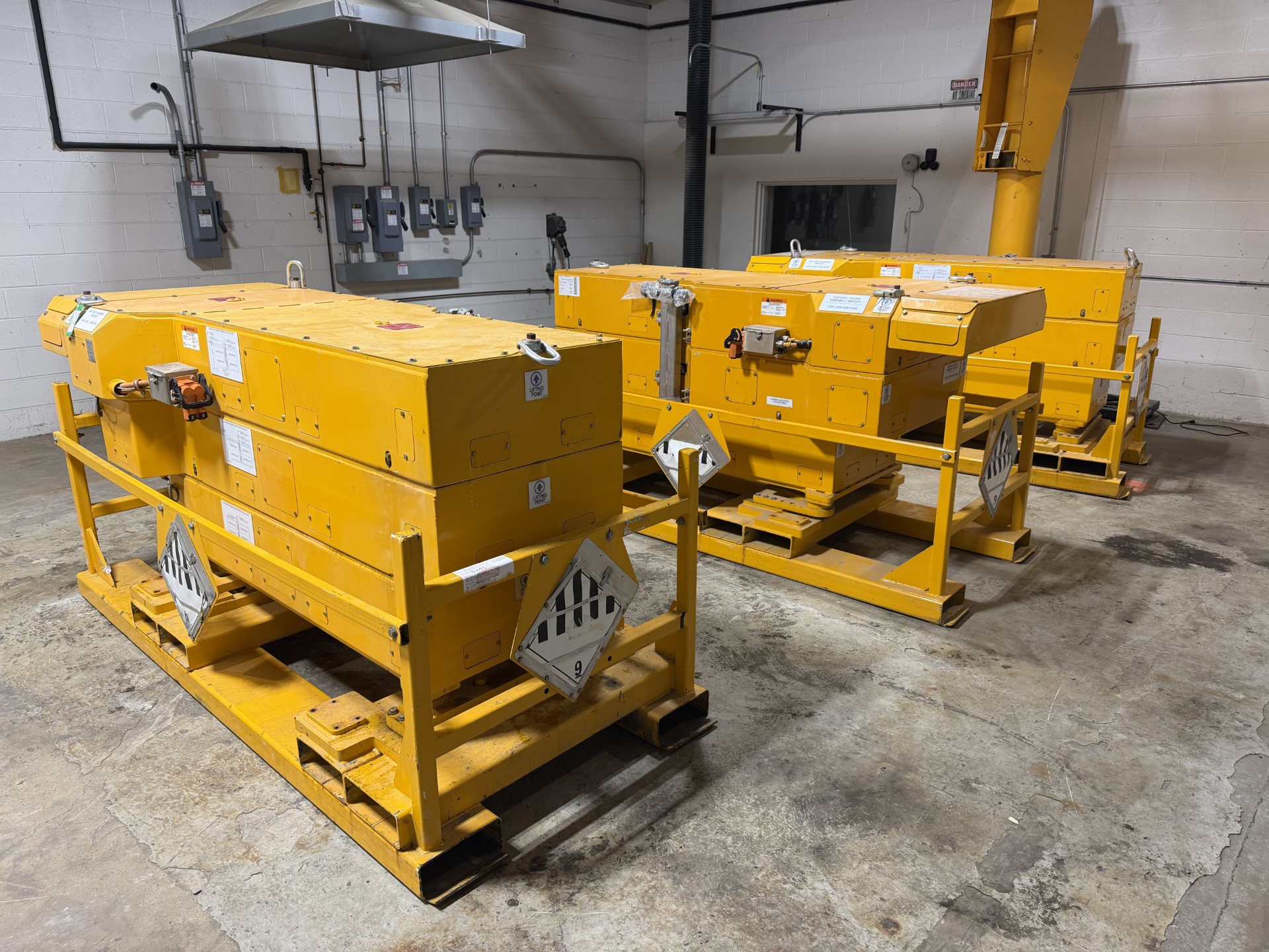 Three large platform Lithium-Ion batteries in a room